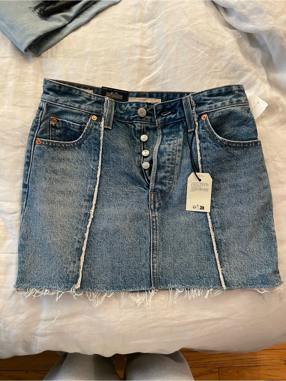 Levi's Distressed Blue Denim Button-Front Mini Skirt